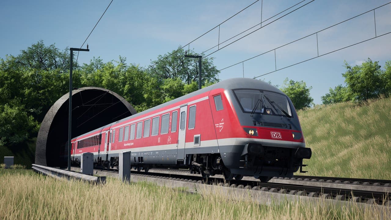 A red DB cab car leading red coaches out of a tunnel between grassy banks in Train Sim World